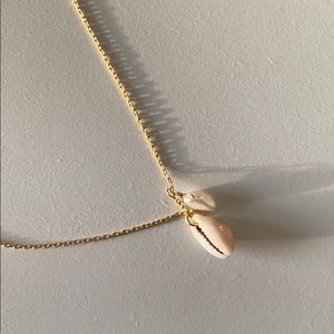 Madewell shell with pearl necklace